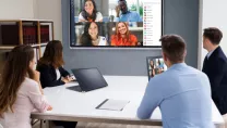 A team meeting using a Windows Collaboration Display